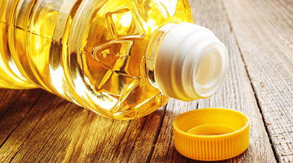 Vegetable oil in plastic bottle closeup