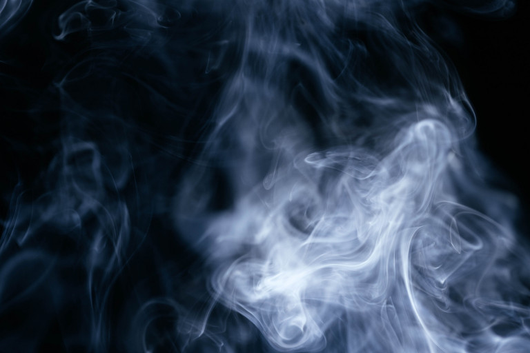 blue-smoke-waves-black-background