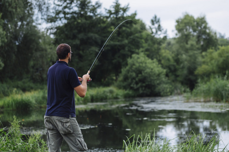 close-up-man-fishing-lake